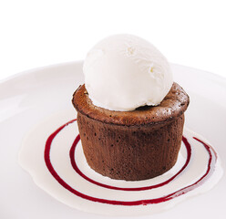 Chocolate fondant and a scoop of ice cream in a white plate