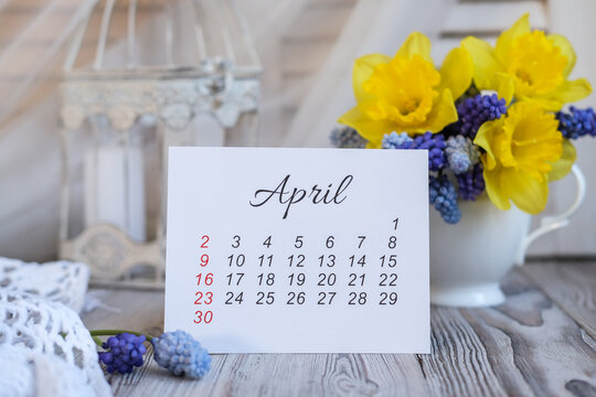 April calendar and spring flowers