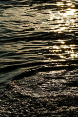 Beautiful sea water hitting by sunset