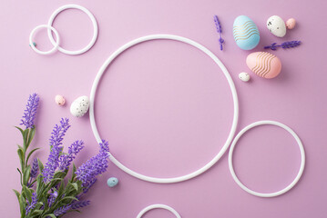 Easter concept. Top view photo of empty circles colorful easter eggs and bouquet of lavender flowers on isolated lilac background with copyspace