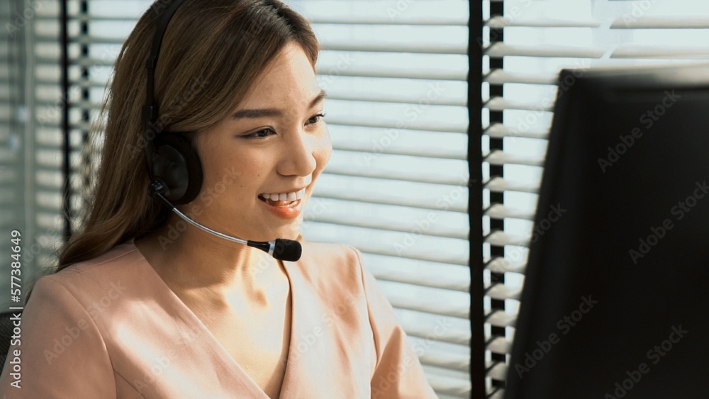 Aufkleber competent female operator working on computer and while talking with clients. concept relevant to bo