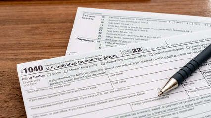 US individual Income tax return document. People have to fill the 1040 form every year to declare...
