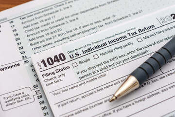 US individual Income tax return document. People have to fill the 1040 form every year to declare their income from the previous year to the Internal Revenue Service of the Department of Treasury 