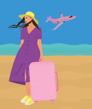 girl with suitcase on the beach