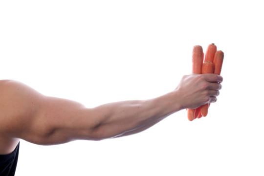 Strong fit muscular male holding carrots in his right hand transparent PNG
