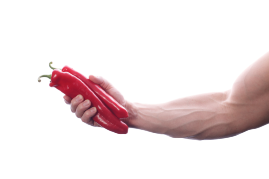 Strong fit muscular male holding paprika in his right hand transparent PNG