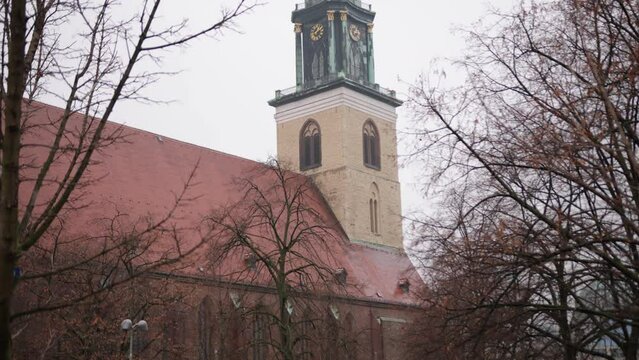 St. Mary's Church, Marienkirche, parish in Berlin. Marienkirche, Berlin's second oldest church on Karl Liebknecht Strasse Karl-Liebknecht-Strasse, in the early XV century on a sunny day in Berlin.