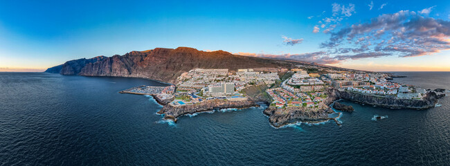 Aerial sunset view of Los Gigantes in Tenerife Canary Islands Spain