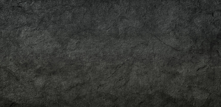black concrete wall , grunge stone texture , dark gray rock surface background panoramic wide banner © AKIO
