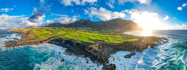 Beautiful aerial view of gold course at sunset on the coast of the Ocean, Buena Vista , Tenerife, Canary Islands