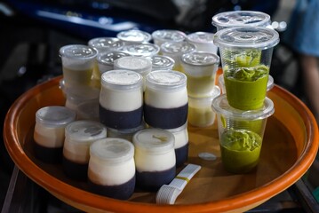 Fresh homemade strawberry yogurt and matcha in vietnamese night market in Da Lat