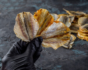 Salted dried capelin fish. Fish appetizer for beer