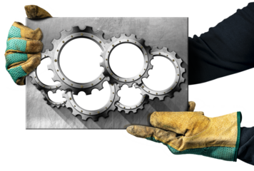 Manual worker with protective work gloves holding a grey metal plate with a group of seven empty metal gears (cogwheels), isolated on white or transparent background with copy space. Png.