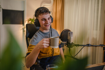 man shooting or streaming video podcast or vlogg blogger at studio