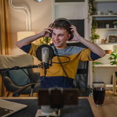 man shooting or streaming video podcast or vlogg blogger at studio