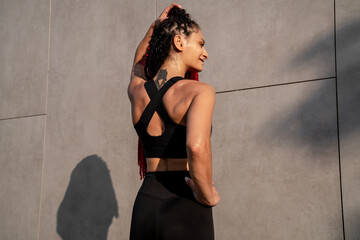 Fitness portrait, exercise and happy woman at gym for a workout, training and body motivation at health club. Face of sports or athlete female happy about performance, progress and healthy lifestyle