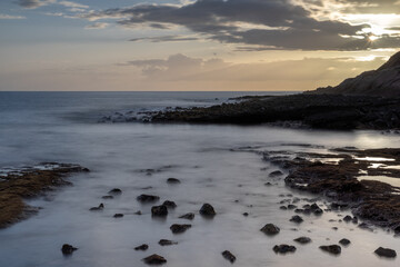 Fototapeta na wymiar Sonnenuntergang am Strand von La Caleta, Costa Adeje, Teneriffa