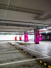empty parking lots in underground parking area in morning