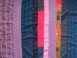 handcrafted stitched silk patchwork cloth close up