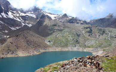 Green lake, South Tyrol, Italy, reservoir in the Alps with mountains in the background, lake with...
