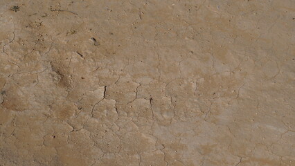 Climate change drought land. Global warming issue, cracked mud in the bottom of a river