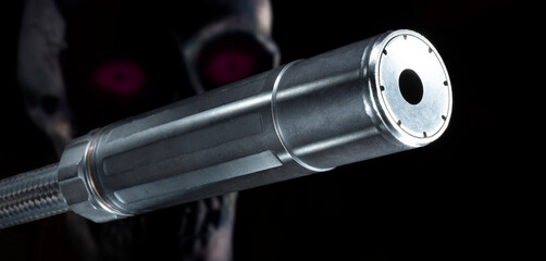 Silencer with a purple eyed skull behind