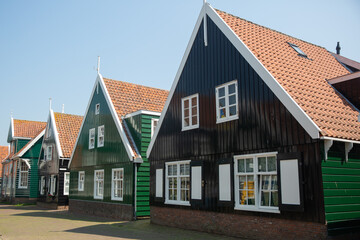 Fototapeta na wymiar Typical houses in the town of Marken island, Netherlands