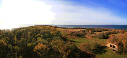Naklejka premium Sea coast and bunker remains on the small island Greifswalder Oie in Germany