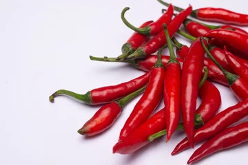 Fotobehang red chili peppers © Neelutpal