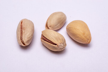 pistachio nuts isolated on white