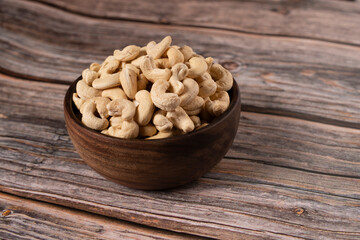 cashews in a wooden bowl