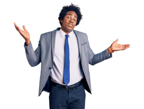 Handsome african american man with afro hair wearing business jacket clueless and confused expression with arms and hands raised. doubt concept.