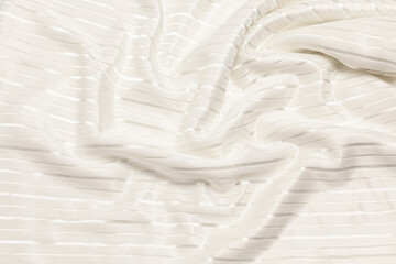 Smooth elegant white silk or satin luxury fabric texture. Top view