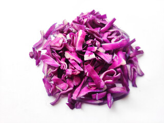 Chopped red cabbage or purple cabbage isolated on white background. Shredded cabbage. Cabbage slaw.Heap of chopped cabbage.