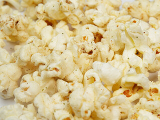 Popcorn Paper cup with lay on white paper popcorn isolated
