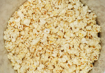 Popcorn Paper cup with lay on white paper popcorn isolated
