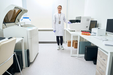 Female health worker is standing in the testing unit