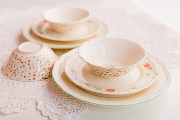 Closeup of porcelain plates and bowls