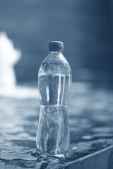 bottle of water, blue tones