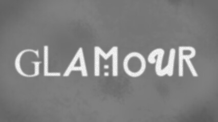 White 'Glamour' Text against Grey Grunge Background