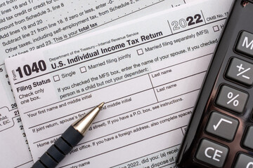 Obraz premium US individual Income tax return document. People have to fill the form 1040 every year to declare their income from the previous year to the Internal Revenue Service of the Department of Treasury