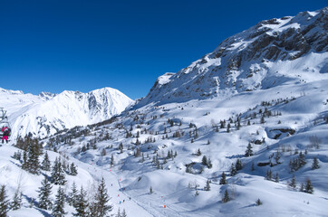 view on slopes of Alp D'Huez  winter resort, France 