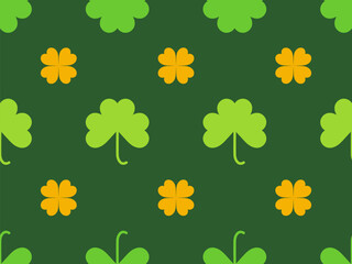 Fototapeta premium Seamless pattern with green and orange clover leaves for St. Patrick's Day. The colors of the Irish flag. Background design for wrapping paper, wallpaper and packaging print. Vector illustration