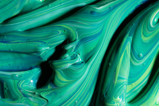 Mix of green and blue paint