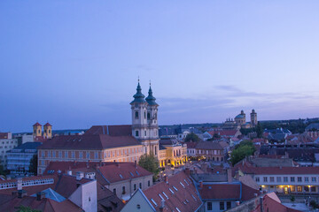 Obraz premium Beautiful view of the Minorit church and the panorama of the city of Eger, Hungary, at sunset
