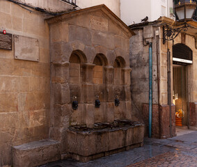 Dog fountain, in del Perro street, Old Town (Casco Viejo), Bilbao, Spain