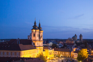 Fototapeta na wymiar Beautiful view of the Minorit church and the panorama of the city of Eger, Hungary, at sunset
