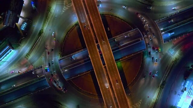Expressway top view, Road traffic an important infrastructure, car traffic transportation above intersection road in city night sky aerial view cityscape of advanced innovation, financial technology	
