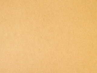 Fototapeta na wymiar brown craft paper texture, cardboard sheet simple wallpaper background