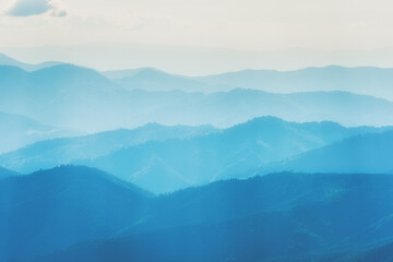 Blue mountains summit nature landscape with fog and mist